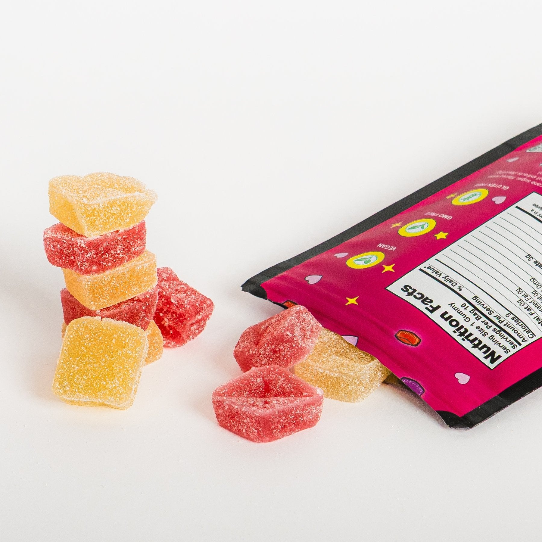 Berry Mix gummies spilling from open bag