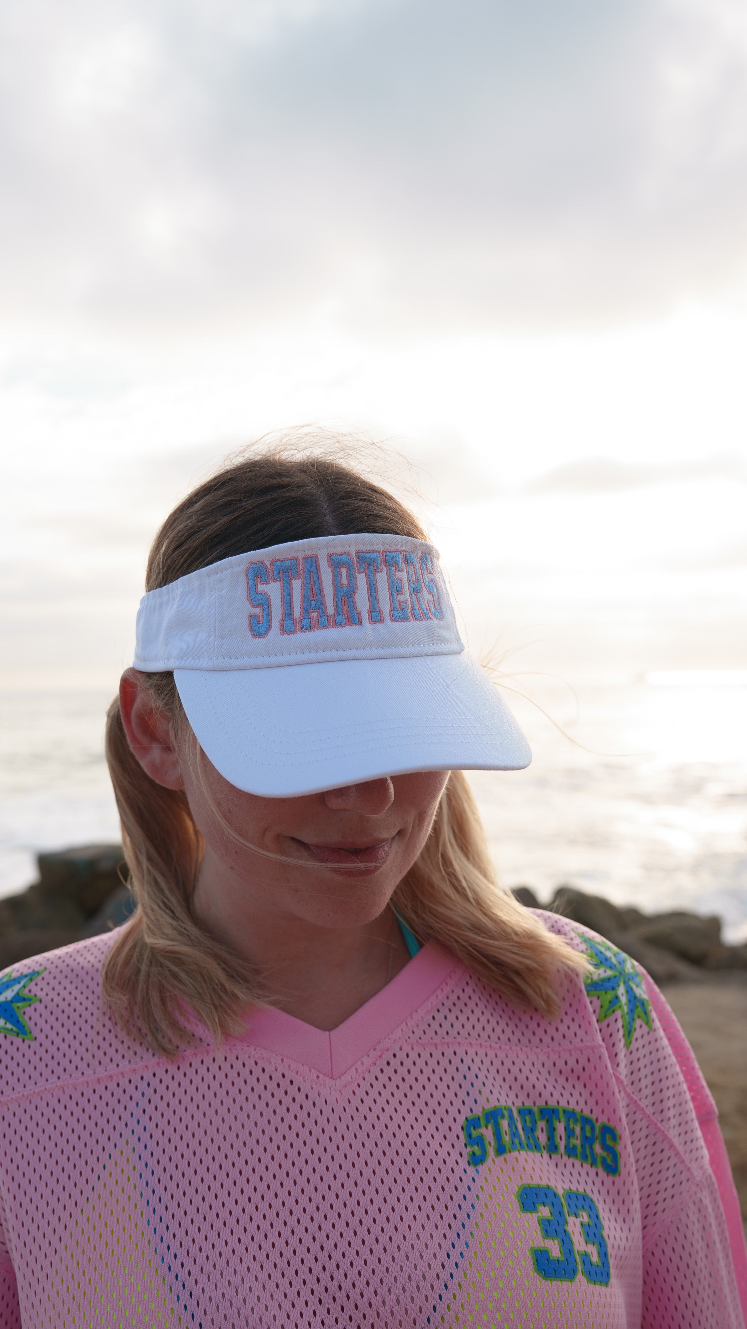 Starters 90s Visor worn with pink jersey