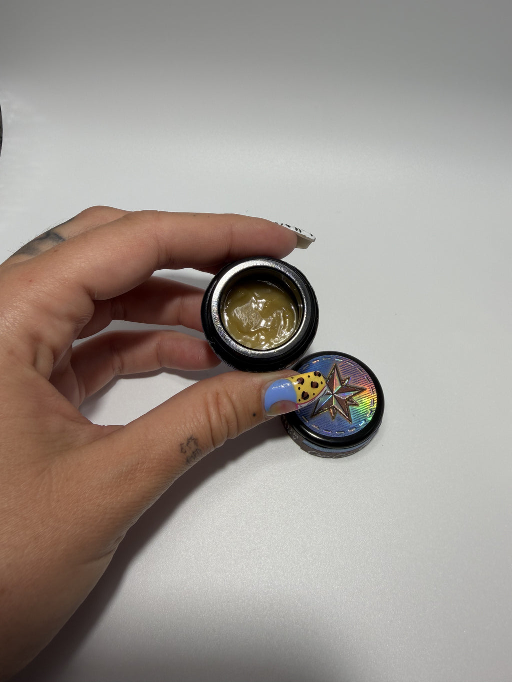 Starters Hash Black Bubblegum jar held in hand