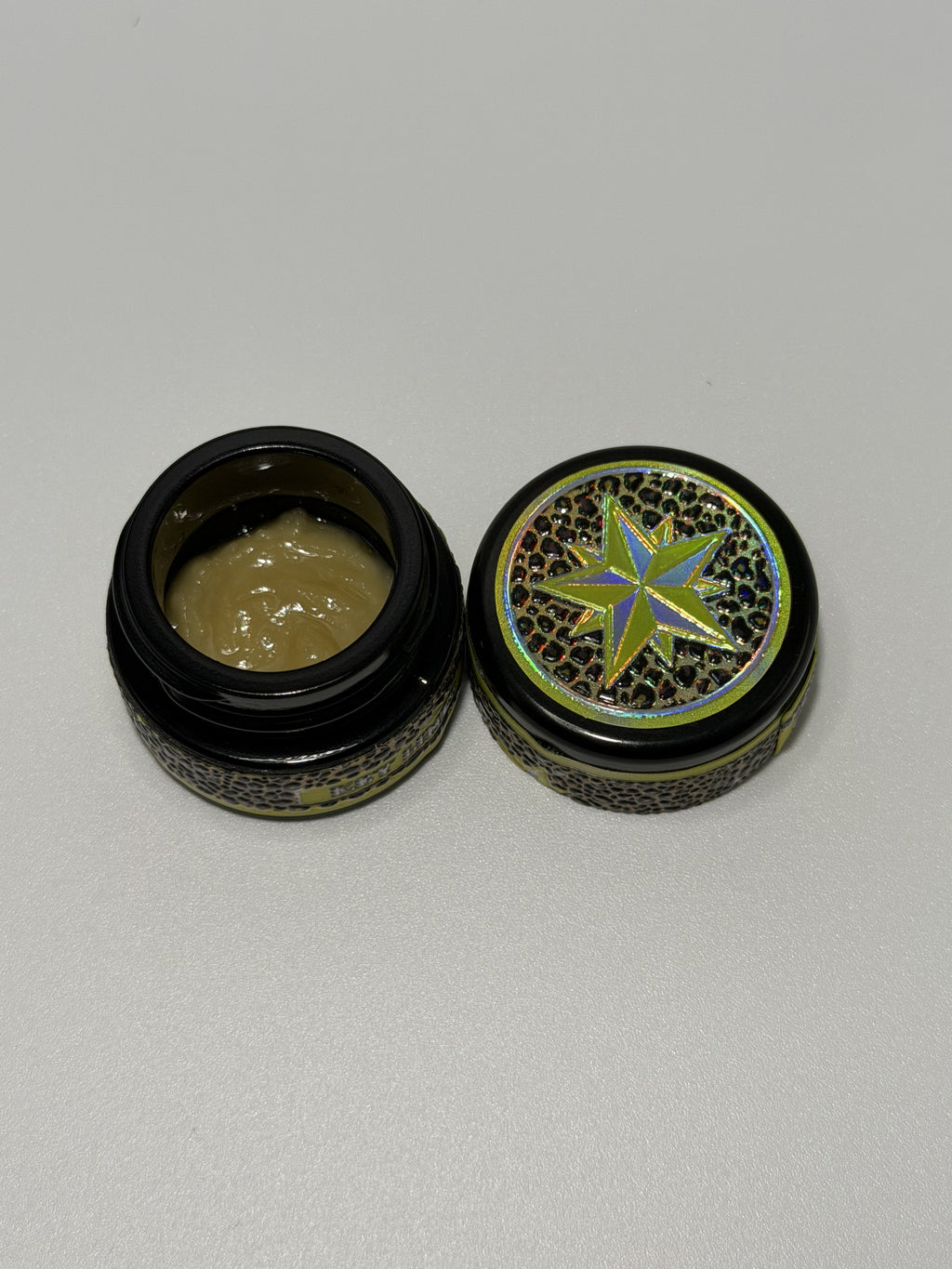 Starters Hash Key Limez open jar next to holographic star lid