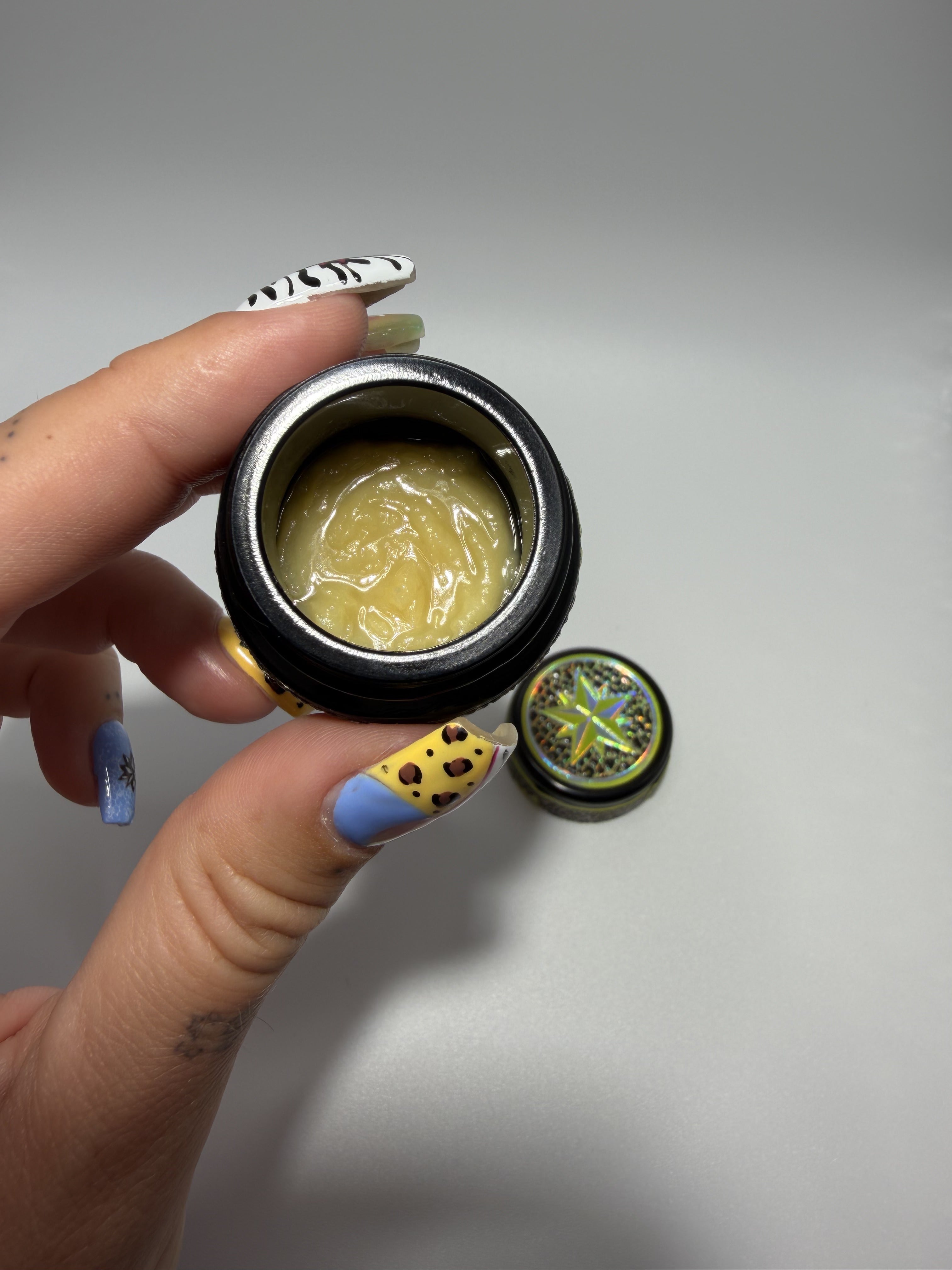 Starters Hash Key Limez jar held in hand