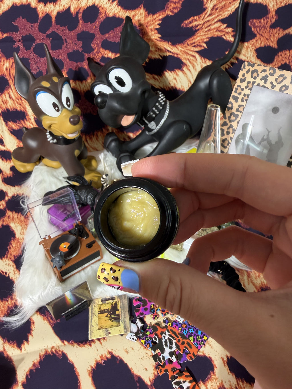 Starters Hash Key Limez jar held over styled leopard scene