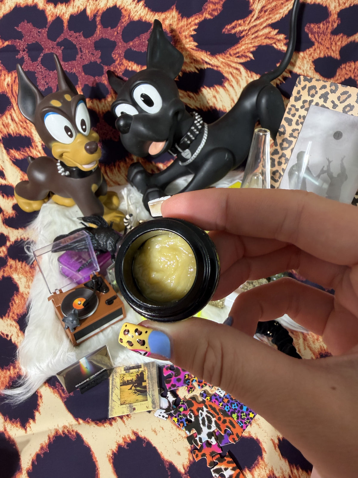 Starters Hash Key Limez jar held over styled leopard scene
