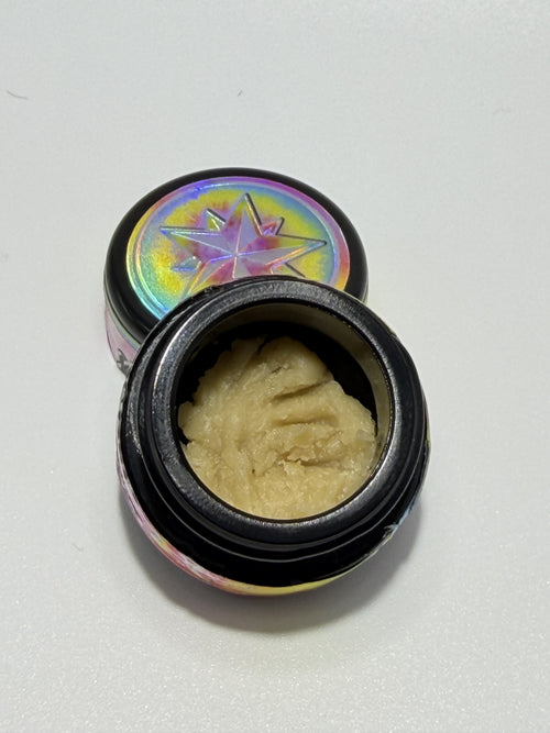 Starters Cold Cure Rosin Rainbow Guava open jar with holographic rainbow star lid