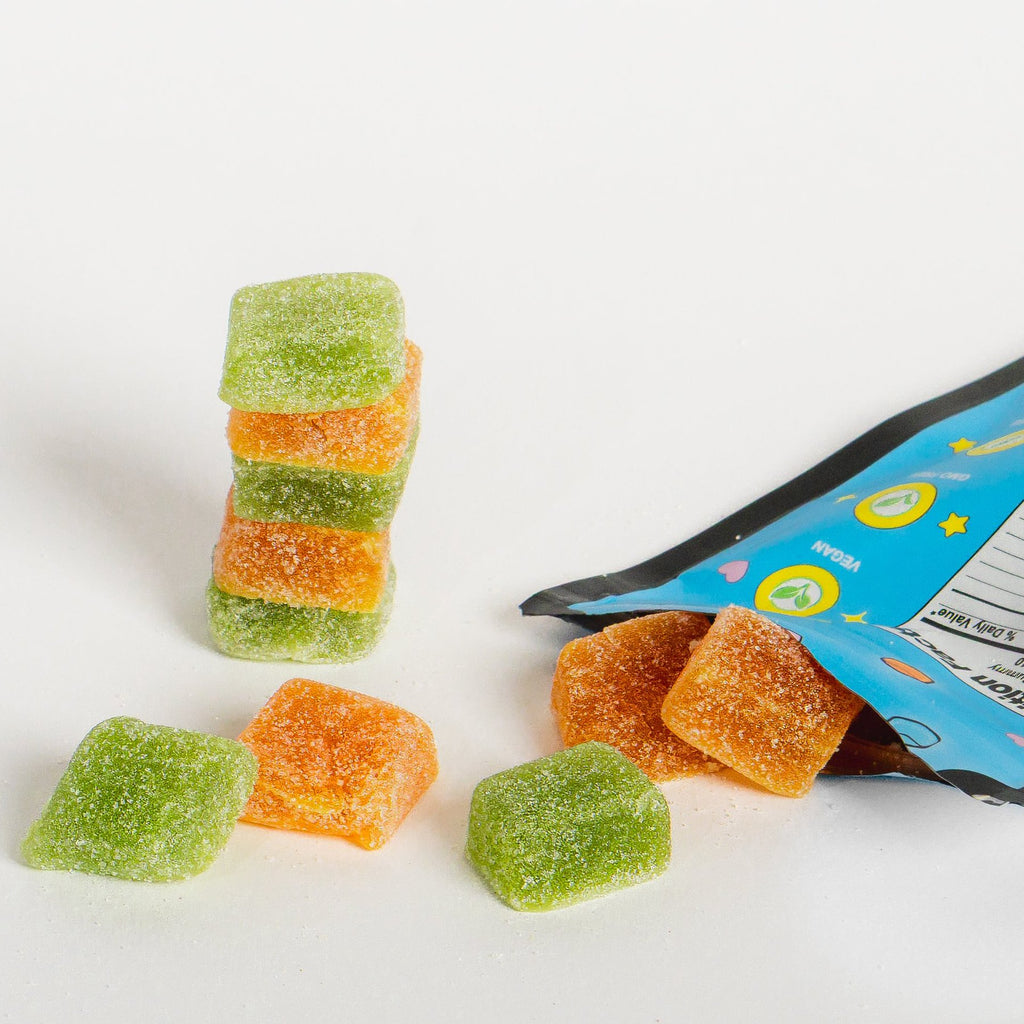Tropical Mix gummies spilling from open bag