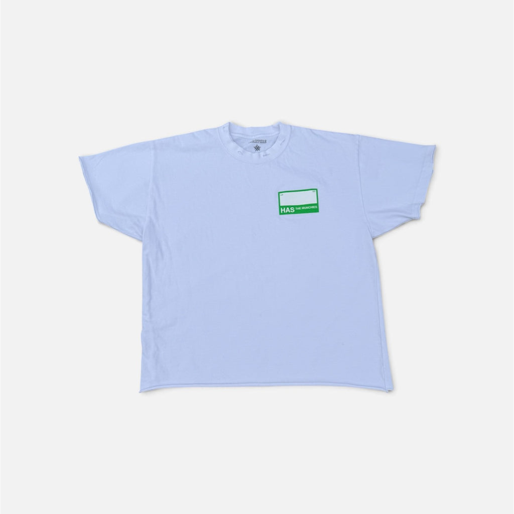 White Name Tag Tee, front with green name tag patch